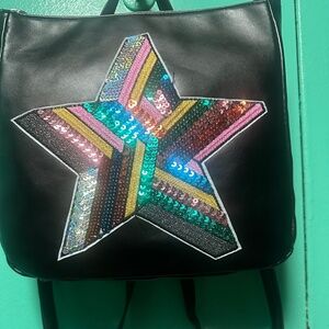 Black backpack sequin star motif faux leather
